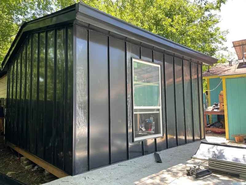 Black standing seam metal wall panels for Metal Roof Installation in Pittsboro